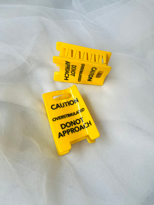 Caution: Overstimulated Hair Clip