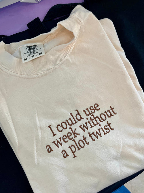 I could use a week without a plot twist | Embroidered T-Shirt