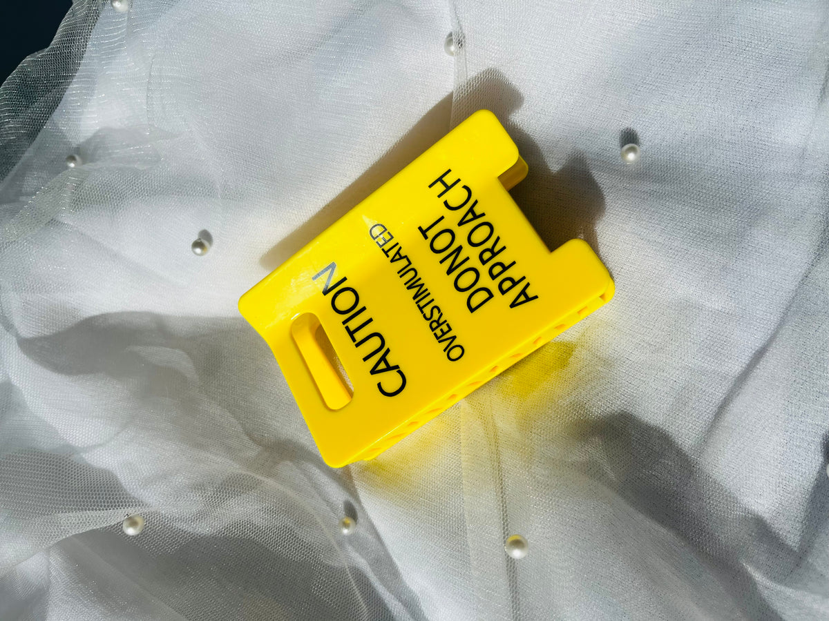 Caution: Overstimulated Hair Clip