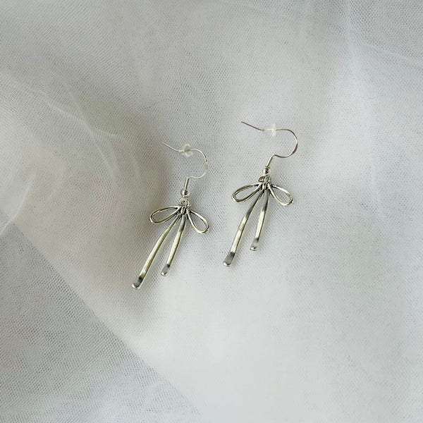 Dainty Silver Bows