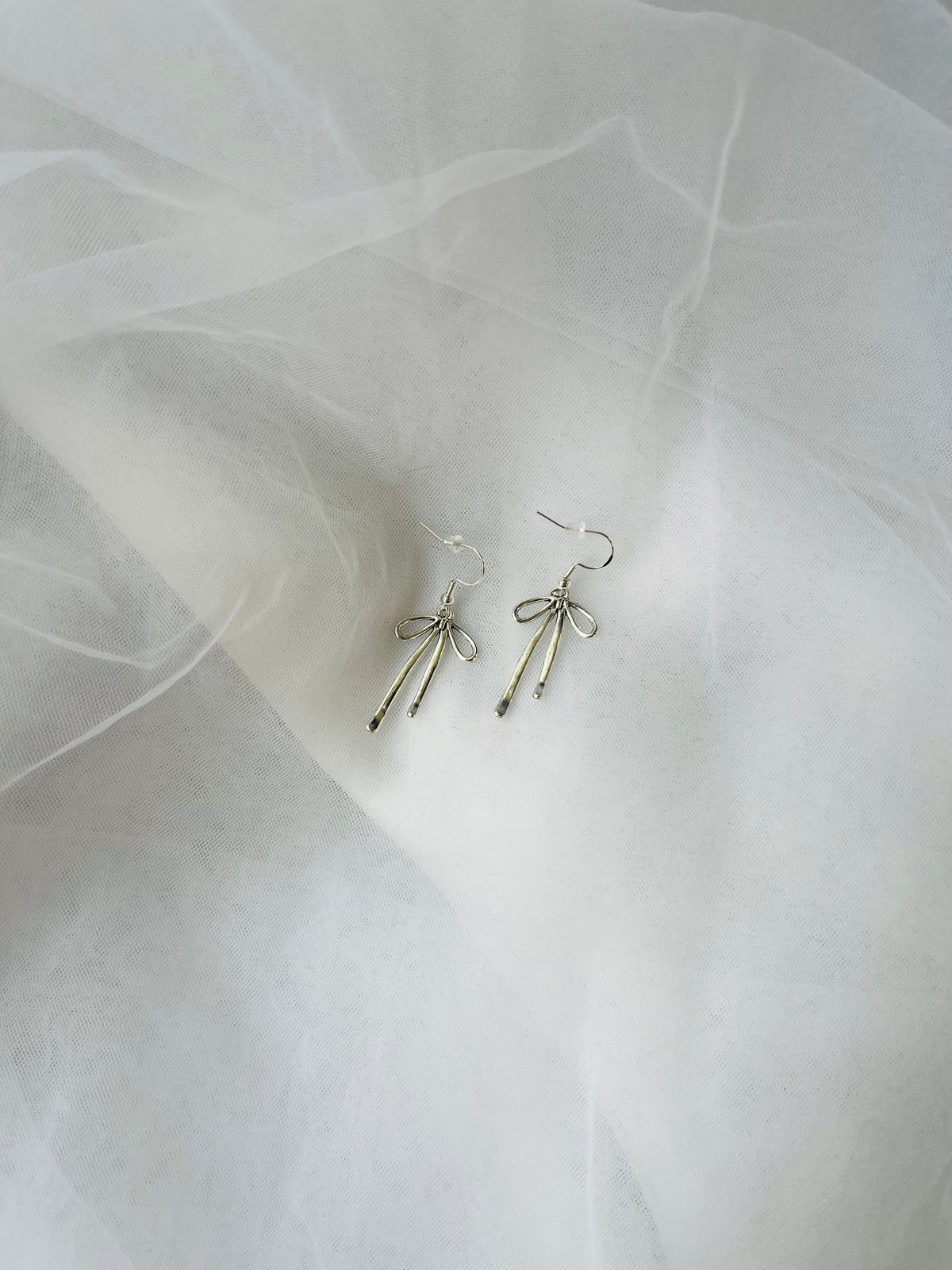 Dainty Silver Bows